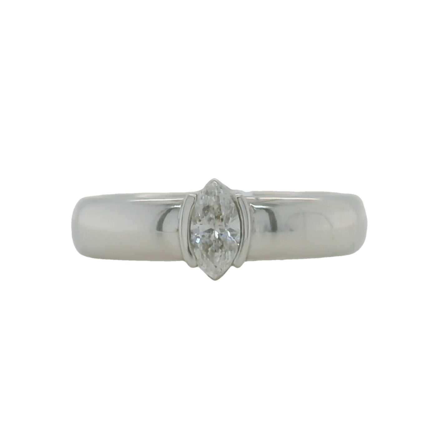 white gold marquise solitaire engagement ring with half bezel setting