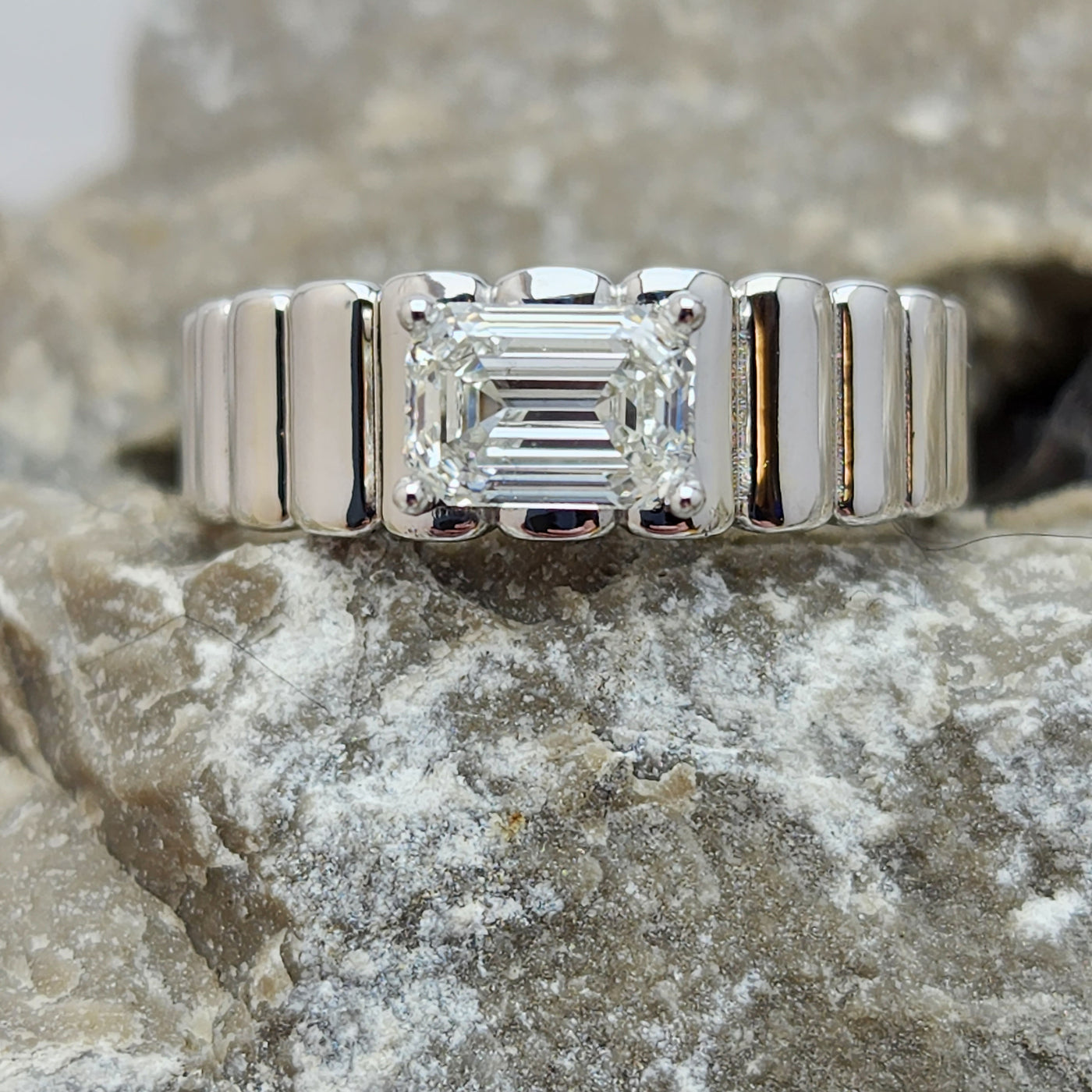 White Gold Solitaire Engagement Ring With East West Emerald Cut Diamond