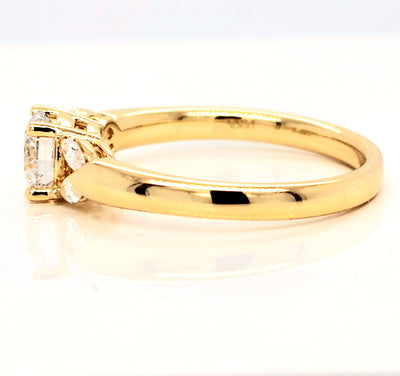 Yellow Gold Engagement Ring With Round Center Stone And Marquise Accents