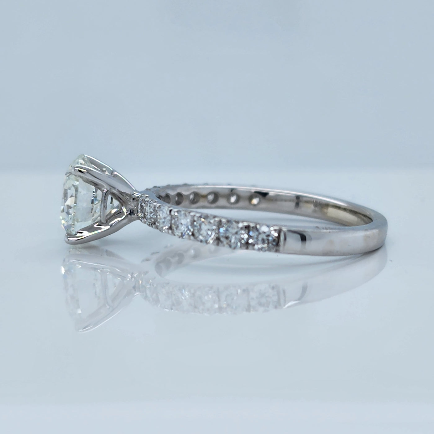 White Gold Engagement Ring With Round Diamond and Round Accents