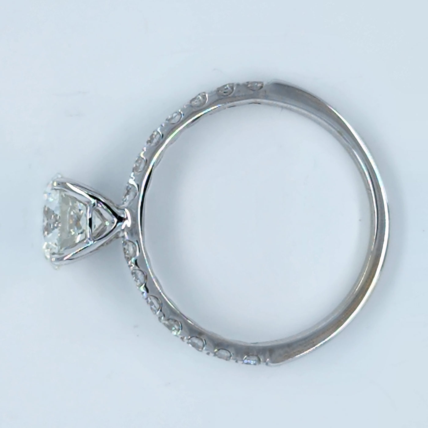 White Gold Engagement Ring With Round Diamond and Round Accents