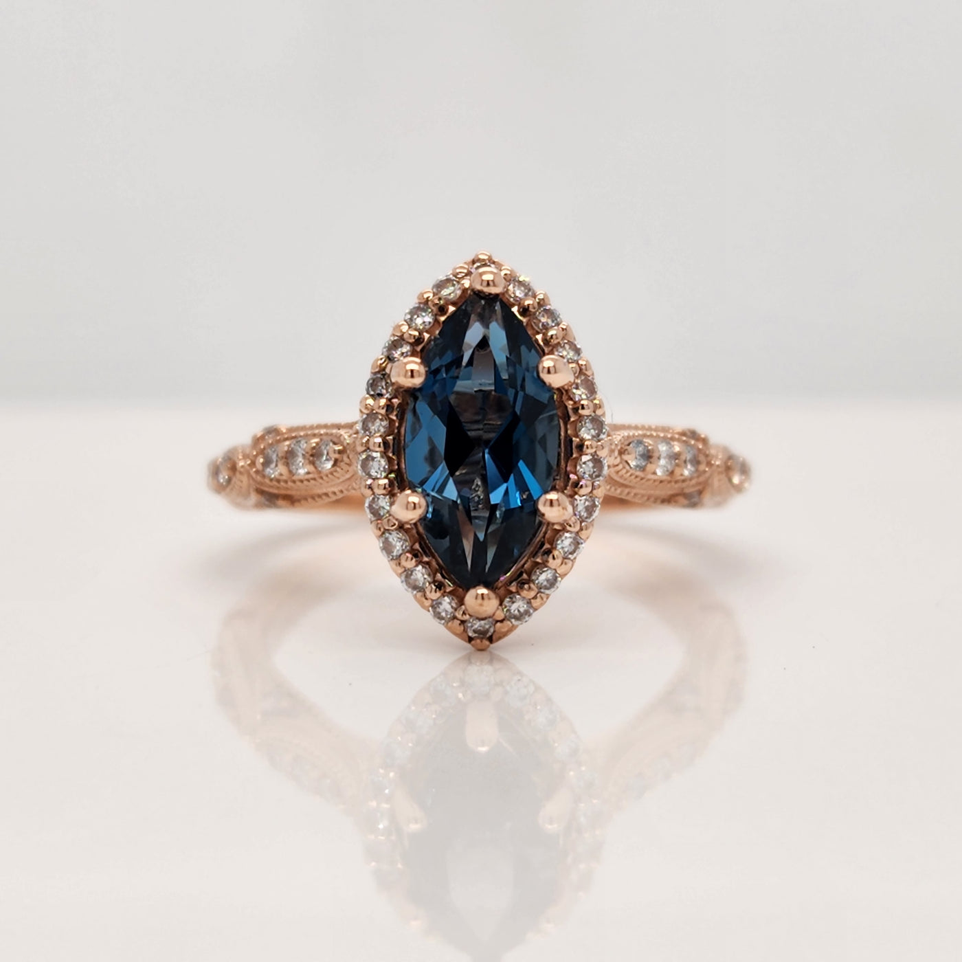 Rose Gold Engagement Ring With Marquise Topaz and Diamond Accents