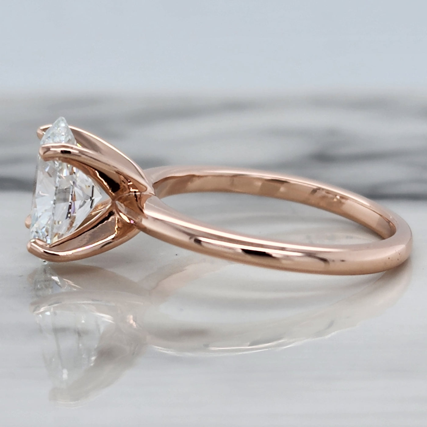 Rose Gold Solitaire Engagement Ring With Oval Center Diamond