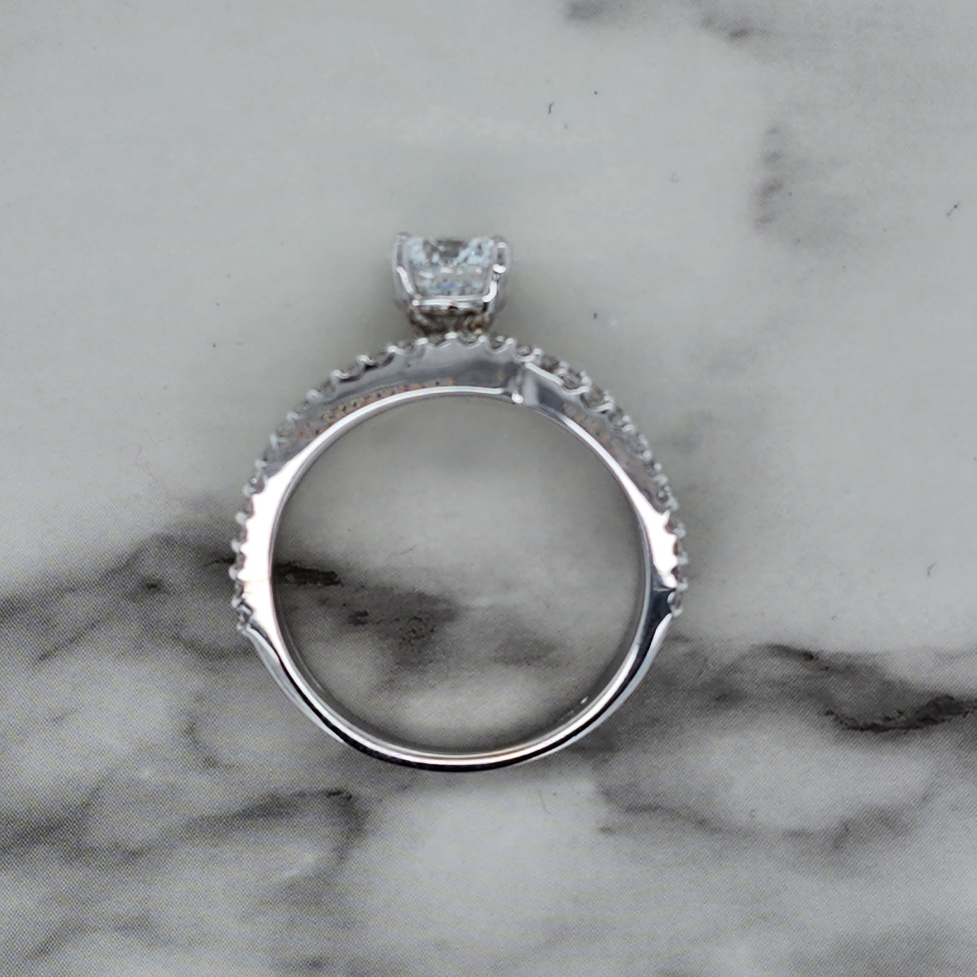 White Gold Engagement Ring With Round Center Stone and Asymmetrical Band