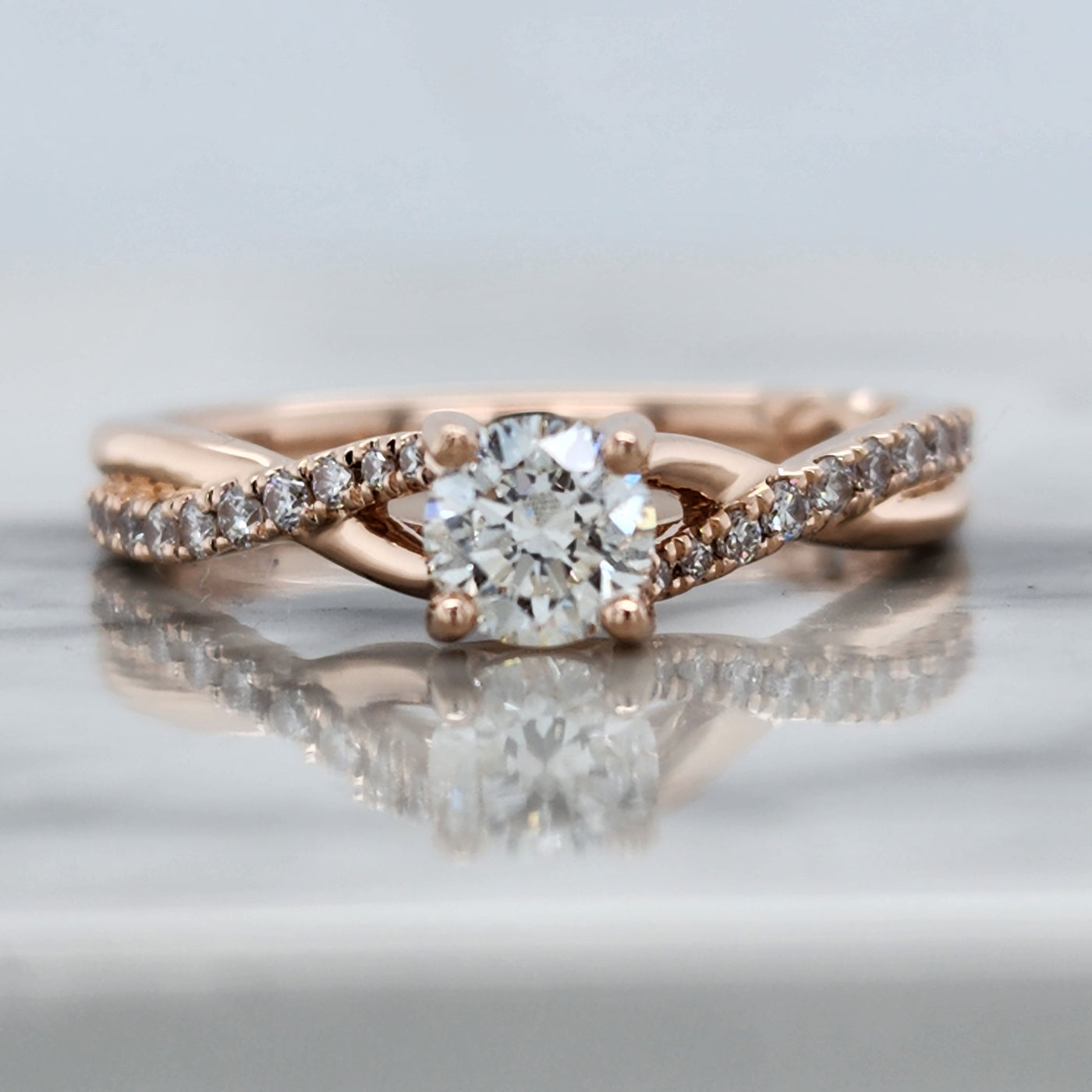 Rose Gold Engagement Ring With Round Center Diamond and Twist Design