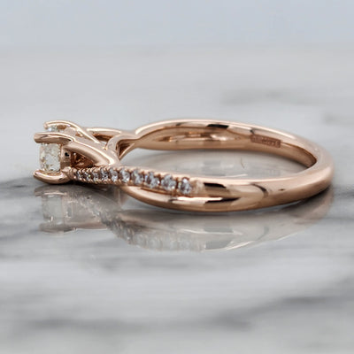 Rose Gold Engagement Ring With Round Center Diamond and Twist Design