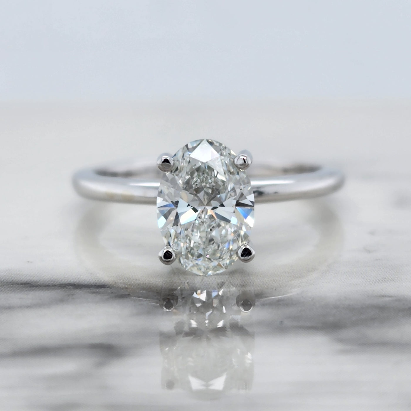 White Gold Solitaire Engagement Ring With Oval Diamond