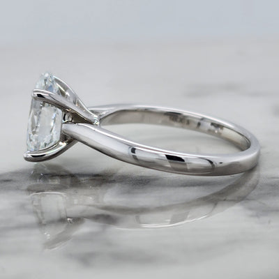 White Gold Oval Solitaire Engagement Ring With Basket Head