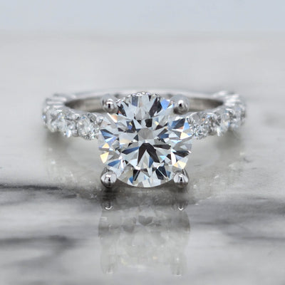 White Gold Engagement Ring With Round Center Stone and Hidden Halo