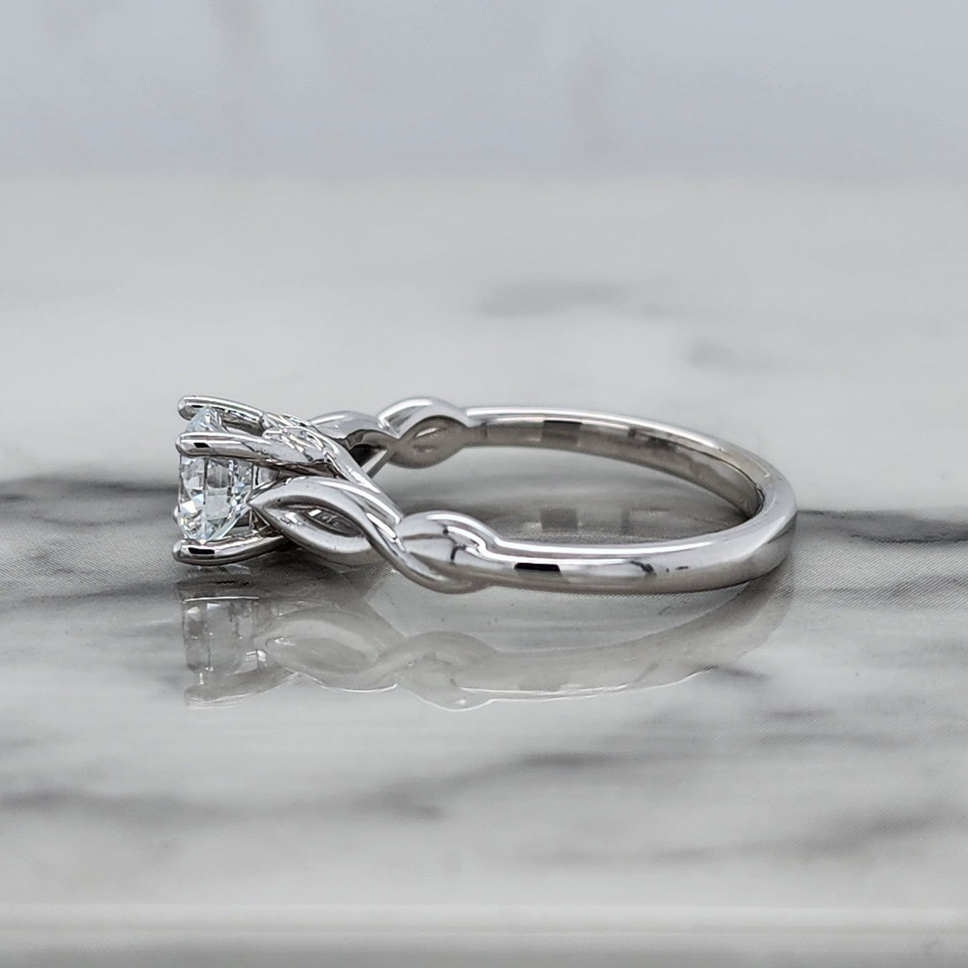 White Gold Solitaire Engagement Ring With Twist Design