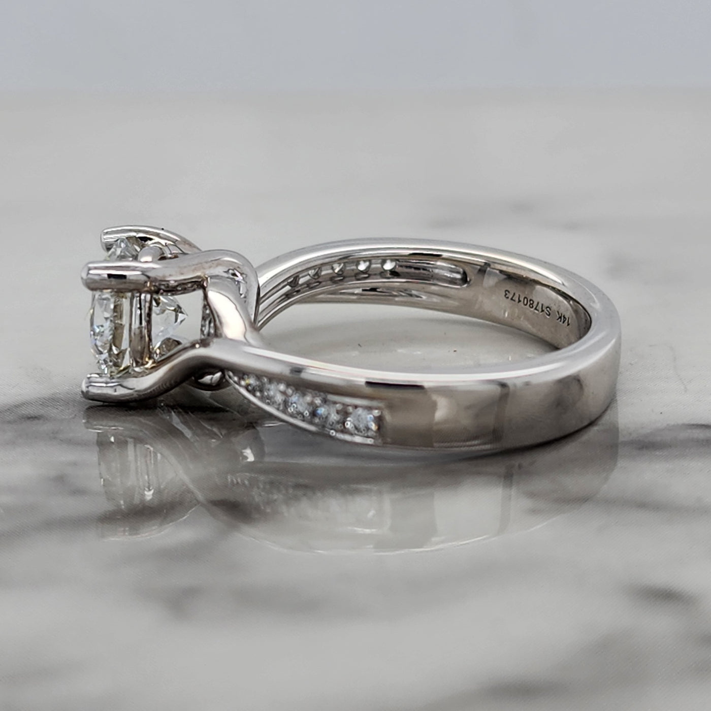 White Gold Bypass Engagement Ring With Round Center and Round Accent Diamonds