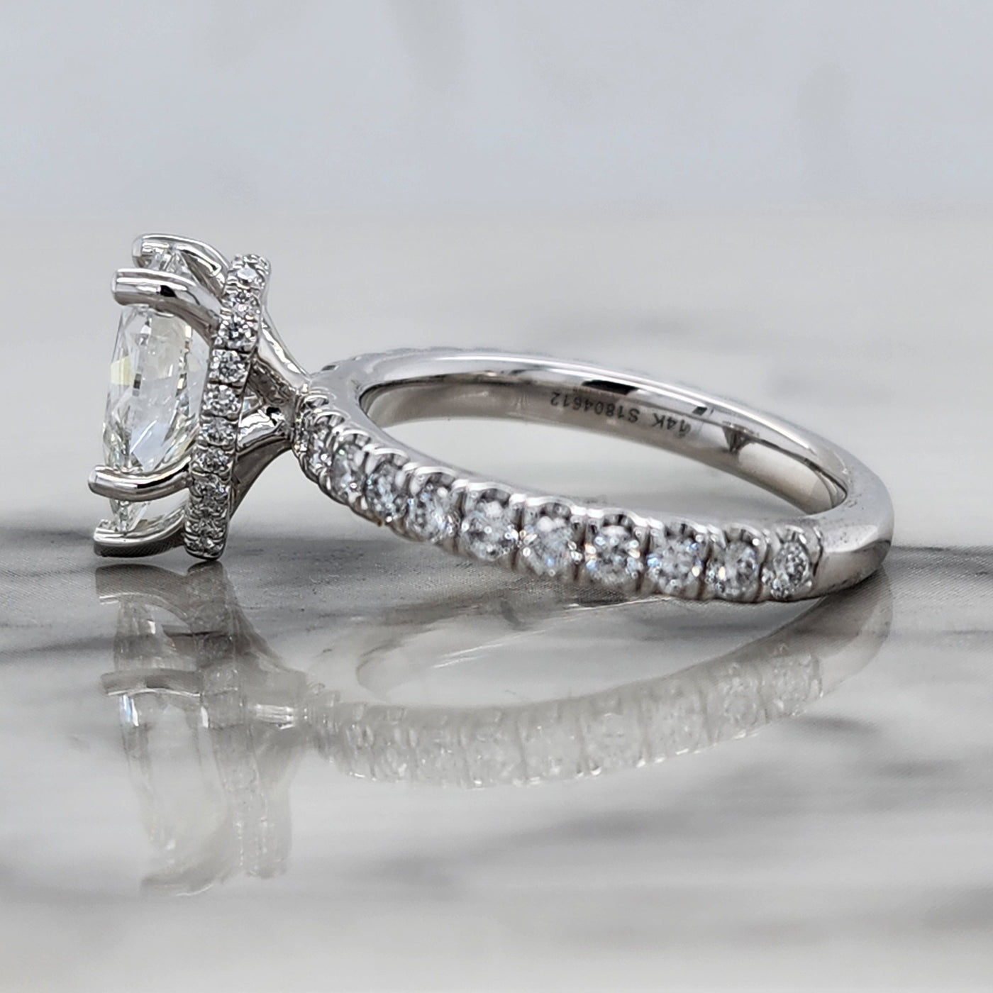 White Gold Pear Engagement Ring With Hidden Halo and Accent Diamonds