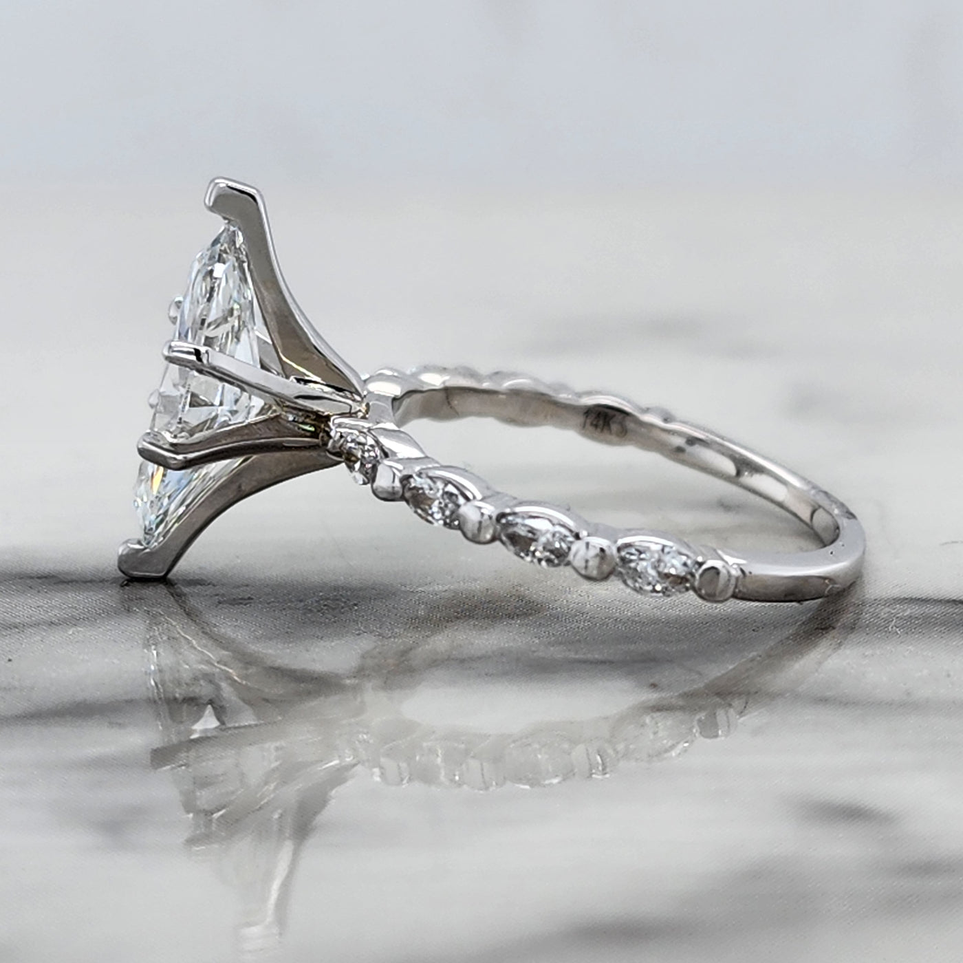 White Gold Marquise Engagement Ring With Marquise Accent Diamonds
