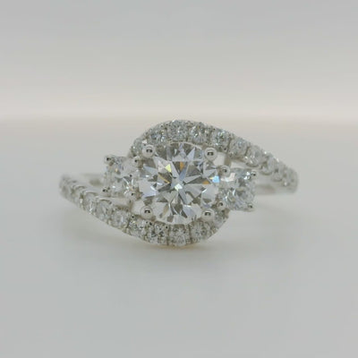 white gold 3 stone round engagement ring with accent diamonds